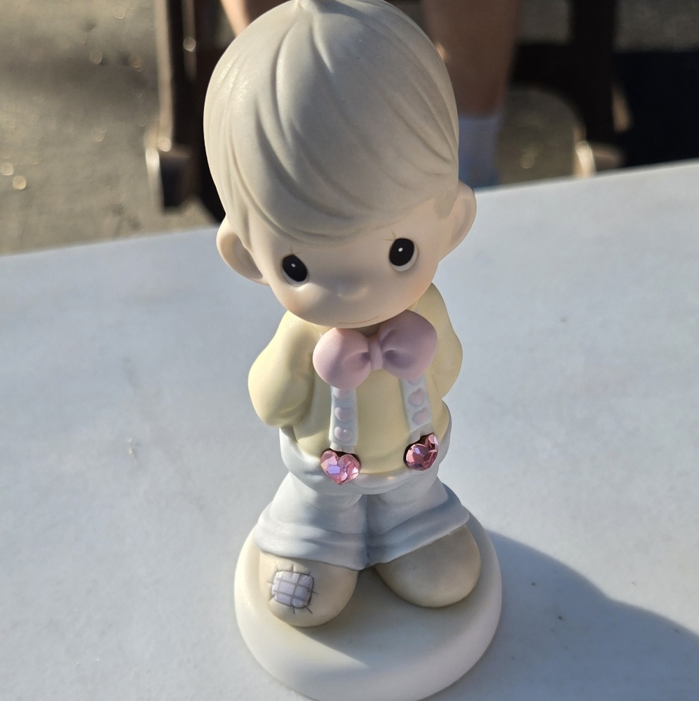 Precious Moments Porcelain Figurine with Pink Accents